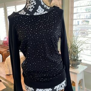 Sweater with glitz.  Shine and glitter under the lights